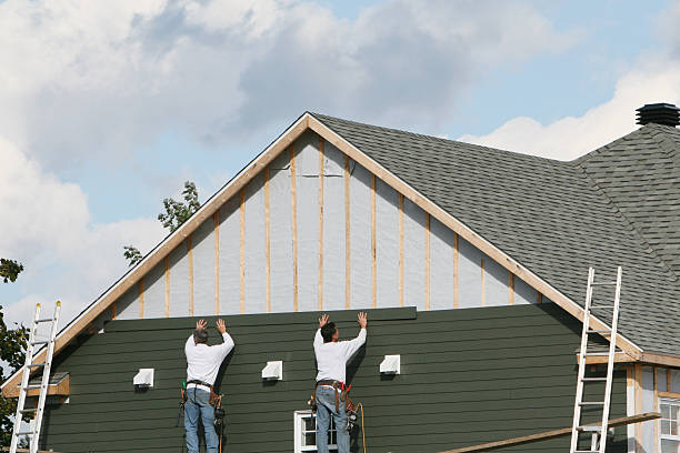 Professional Siding Replacement technician working in Roanoke, TX